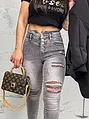 Roztrhané skinny rifle s vysokým pásom