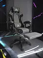 STRIKE otočné herné kreslo s podnožkou a vankúšmi