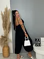 Čierny overal s vypchávkami a zlatou ozdobou DIVA